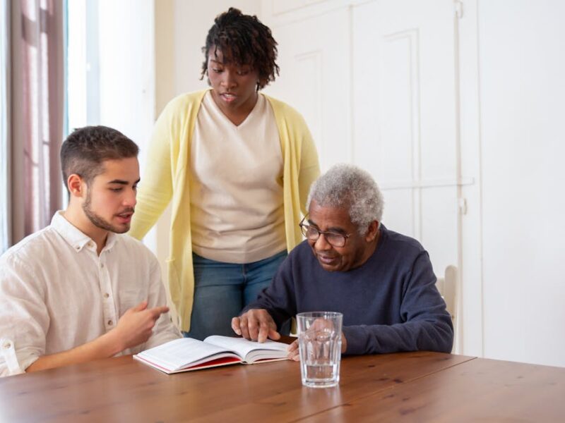 people meeting at a desk